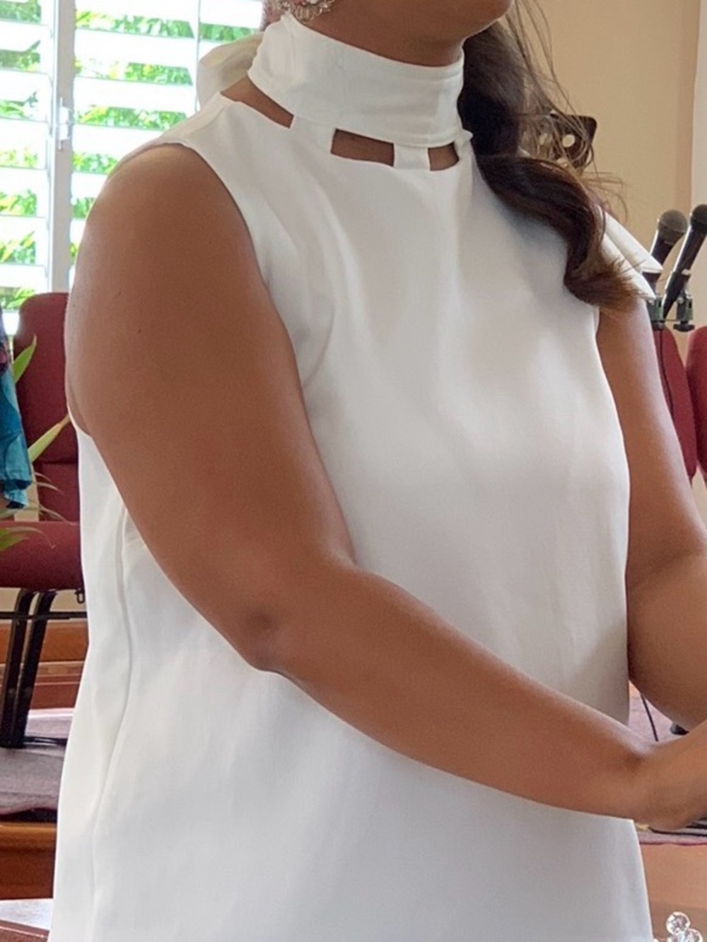 Ina White Sleeveless Ruffle-Hem mock neck